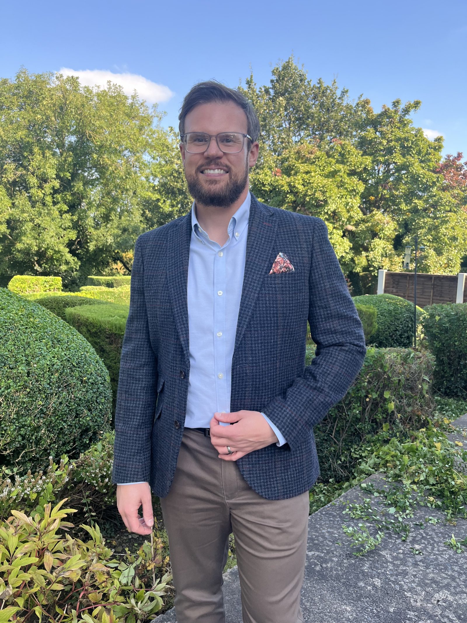 Martin Birch, managing partner of Belmayne, standing in a garden